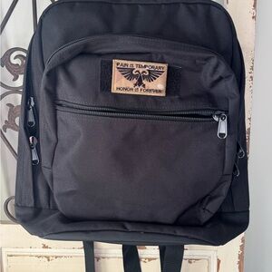 Flying Circle Black Backpack with removable Patch